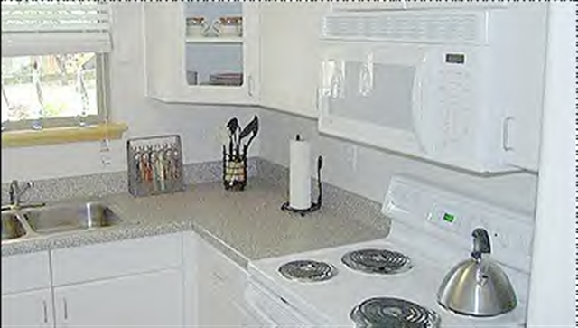 white on white appliances,downtown apartments